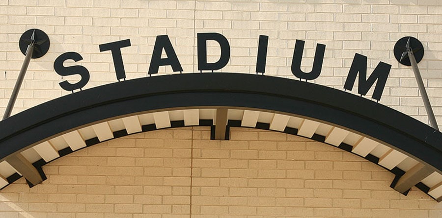 painted cast aluminum letters in matte black with bottom stud mounts for stadium outside