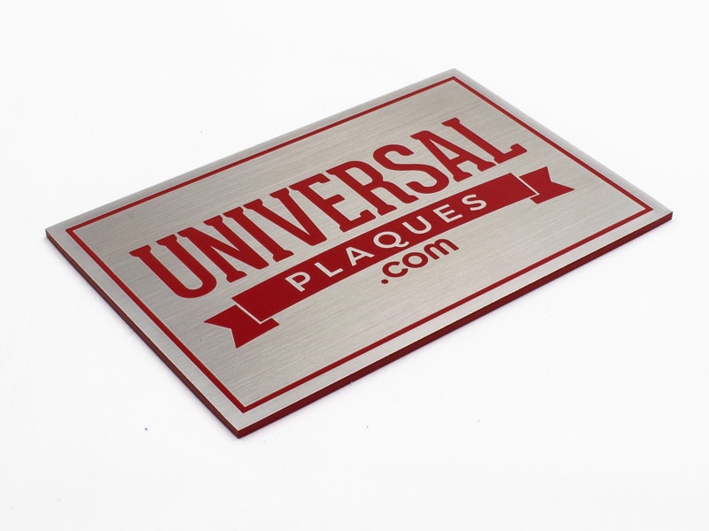 Etched Stainless Steel with Brick Red Background